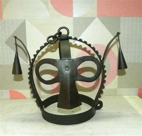 scolds bridles shame mask.